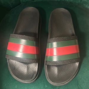 Gucci web rubber slides.